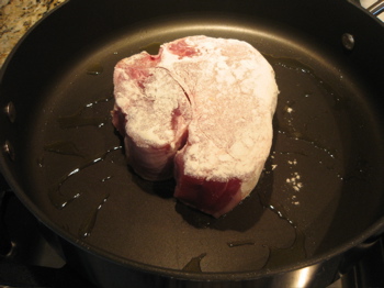 Dust lightly, season and sautée chops in olive oil.