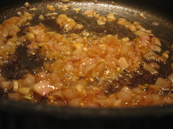 After shallots have softened and are starting to brown, I add the minced garlic.
