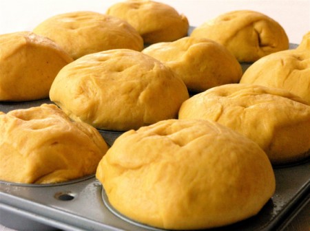 Place dough balls in muffin tin